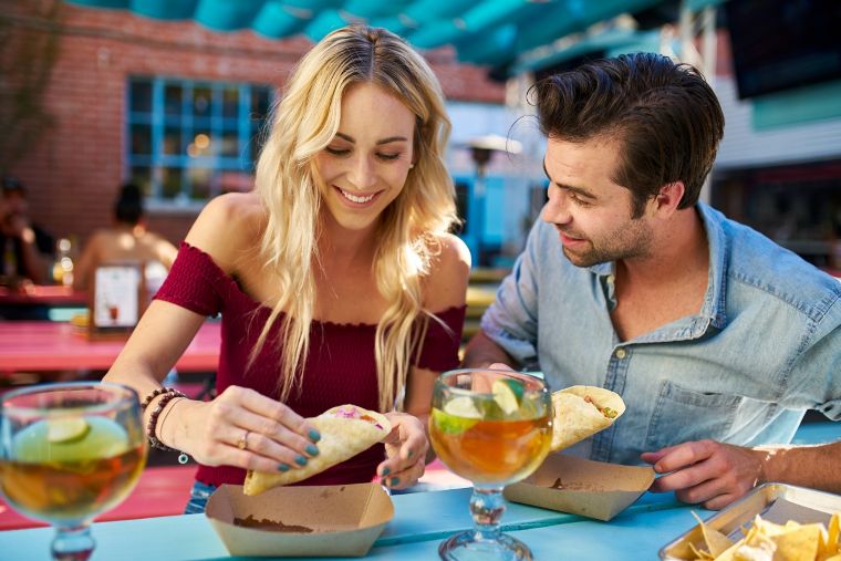 Dating Burnout: What Is It And How Do You Cope With It? 1 Eating In A Restaurant At A Date